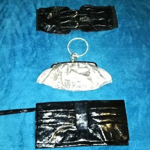 2 clutch bags and a leather waist belt